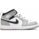 Sneakers alte larghezza A grigie di gomma con stringhe per Donna Nike Air Jordan 1 Mid Michael Jordan 