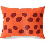 Cuscini arancioni per divani 