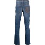 Jeans skinny con ricamo monogramma