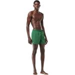 Pantaloncini scontati verdi XL in poliestere tinta unita per la primavera da mare per Uomo Lacoste 