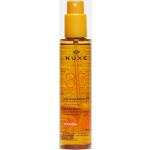 Creme protettive solari viso spray al rosmarino texture olio SPF 30 per Donna Nuxe 