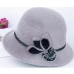 Cappelli invernali 60 eleganti neri tinta unita con pon pon per l'autunno per Donna 